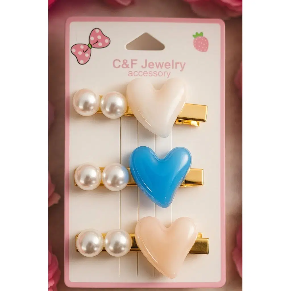 Altın Renk Zeminli Figürlü İnci Detaylı Saç Tokası – Şık ve Zarif Tasarım